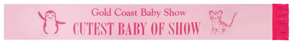 Plain baby body sash 348 on candy, with pink lettering and hot pink fringe.