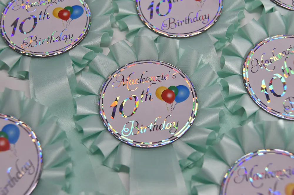 One tier economy rosettes with custom printed button.