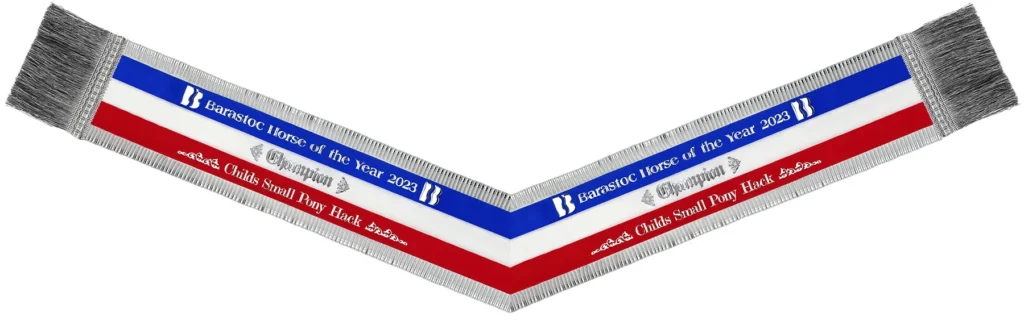 Equestrian v-neck sash with pleated edging.