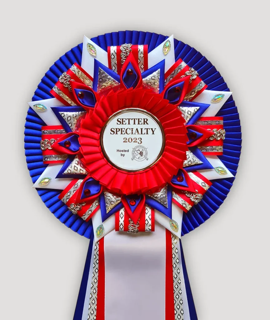 Special knife pleated lamé rosette with curls, petals and diamantes.